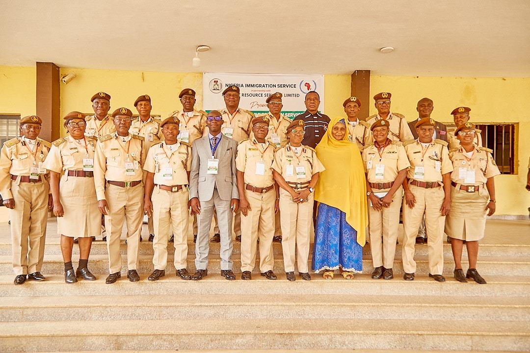 A picture of the participants and some of the facilitators after a lecture session