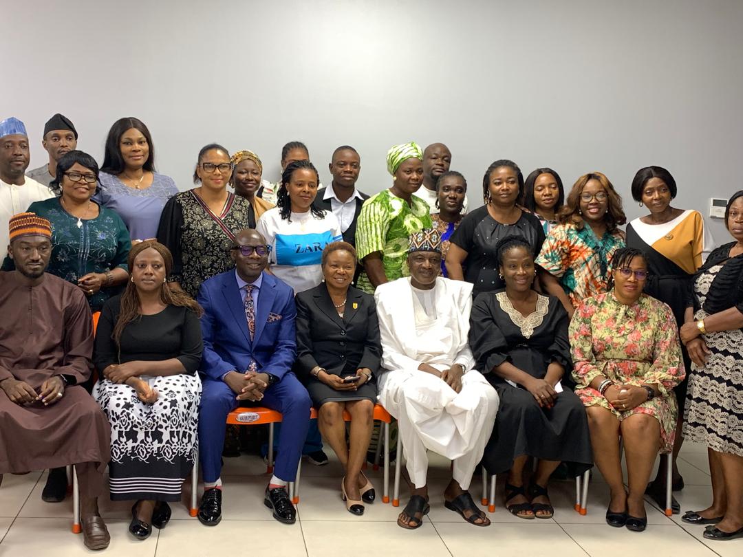 Group photo of workshop participants and facilitators at an Instinct Resource Services Limited training program