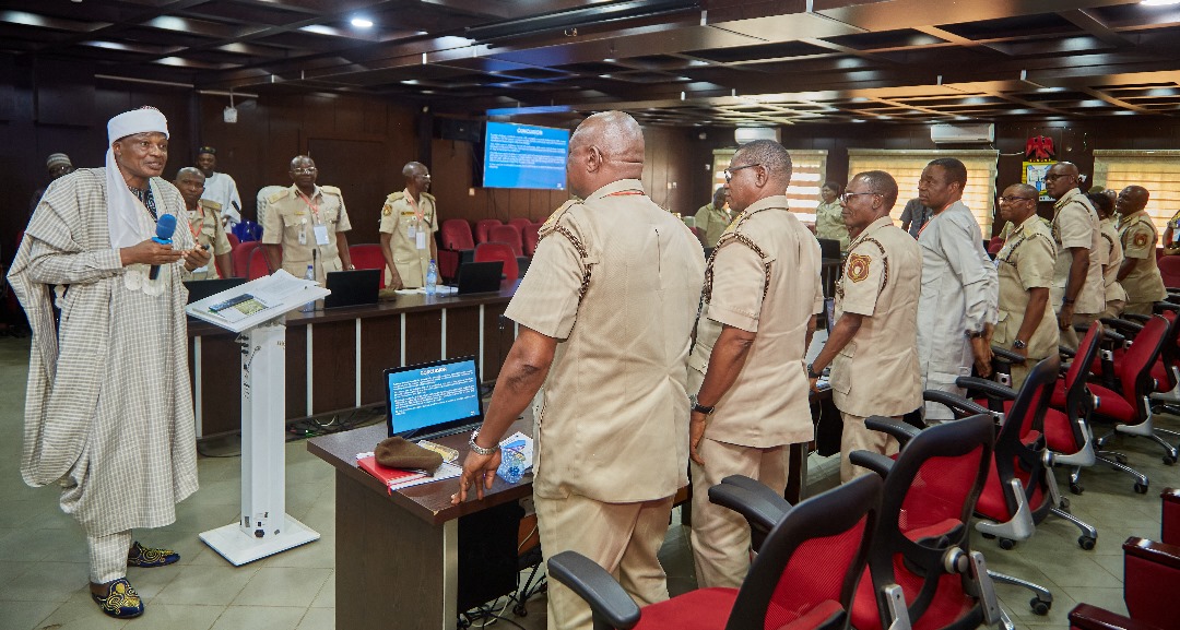 The chairman presenting a paper at a Pre-Retirement Training organized for the senior officers of the Nigeria Immigration Service (NIS)