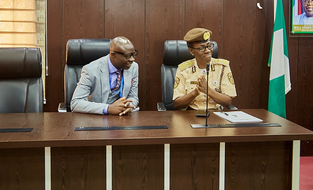A picture of the Managing Director and the Deputy Comptroller General, Human Resource of the Nigeria Immigration Service, A.J Umana during a Pre- Retirement Workshop organized by the Instinct Resource Services Limited.